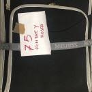 Varias bolsas y maletas con ropa seminueva